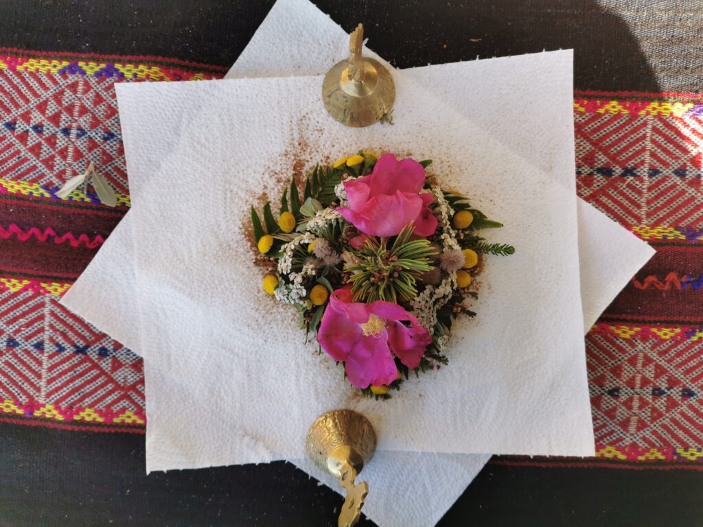 despacho ceremony pink flower and bells